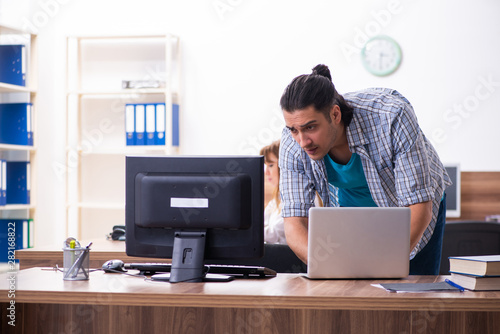 Young male it specialist in the office