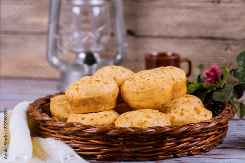 Pao de queijo, mineiro, cheese bread in basket. photo