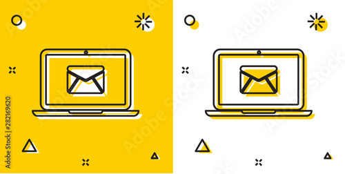 Black Laptop with envelope and open email on screen icon isolated on yellow and white background. Email marketing, internet advertising concepts. Random dynamic shapes. Vector Illustration