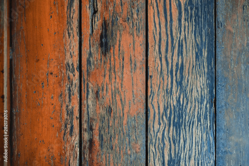 Dark brown wood texture with natural striped pattern background © pookpiik