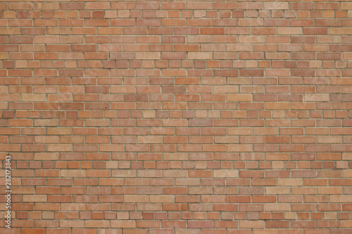 Attractive but grungy rose beige color brick wall texture background