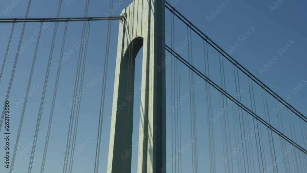 Slow and buttery smooth slight orbit of towering Verrazano bridge arch Slow and buttery smooth slight orbit of towering Verrazano bridge arch