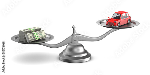 car and money on scale on w...