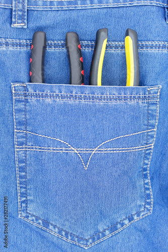 Several tools in new jeans pocket