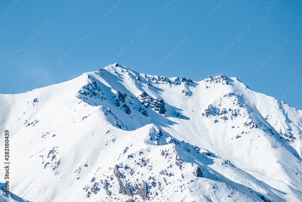 mountains in winter, snow capped peaks, mountain winter landscape