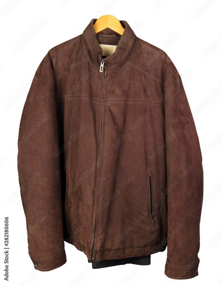 A warm autumn corduroy jacket brown jacket of my grandfather hangs on a hanger isolated A warm autumn corduroy jacket brown jacket of my grandfather hangs on a hanger isolated