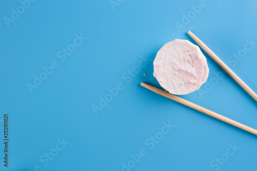 sweet sushi on blue background