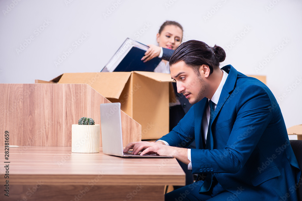 Two employees being fired from their work Two employees being fired from their work
