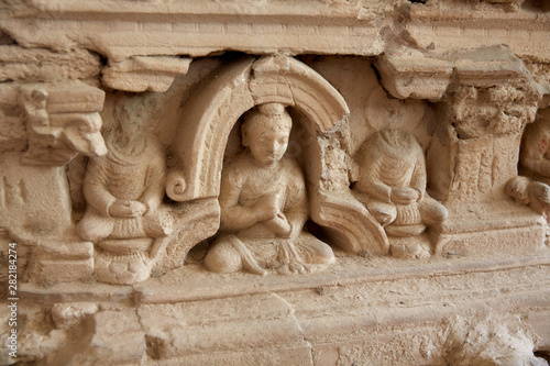 The sedentary statue of Buddha at a niche on the wall of the stupa base, Jaulian archaeological Complex, in the Khyber Pakhtunkhwa Province of Northern Pakistan