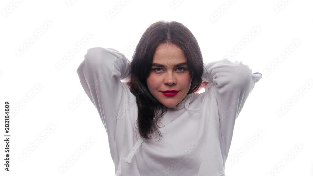 A beautiful sweet girl froze and trying to keep warm - White background - Face Expressions A beautiful sweet girl froze and trying to keep warm - White background - Face Expressions