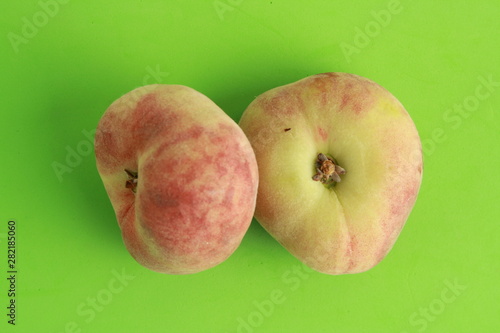 Paraguayan peach on colorful background photo