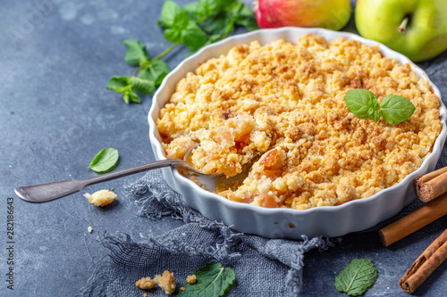 Homemade apple crumble with cinnamon. photo