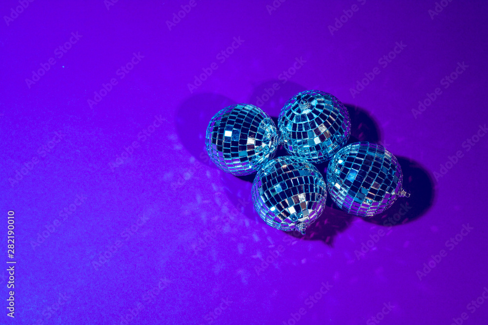 disco ball shines on purple background close up disco ball shines on purple background close up