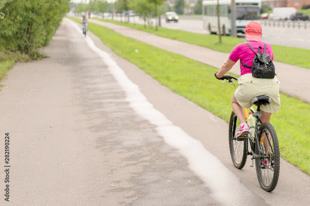 Healthy lifestyle - people riding bicycles in city. Healthy lifestyle - people riding bicycles in city.