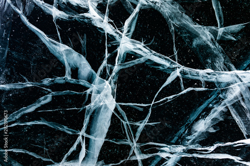 Cracked ice close up. Patterns of winter Baikal.