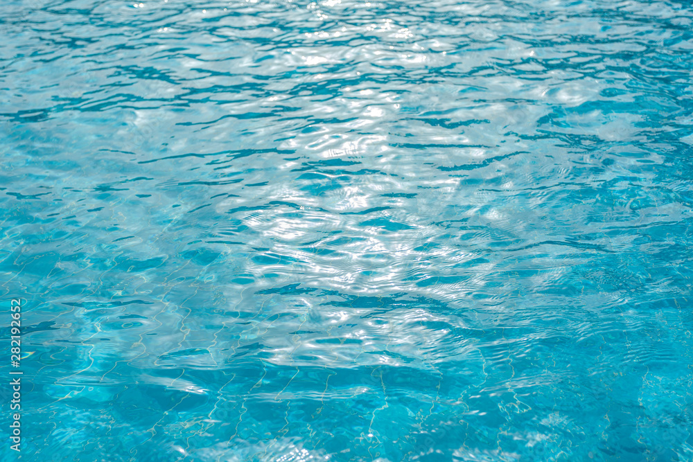 Beautiful blue pool water background. Horizontal colour photography.