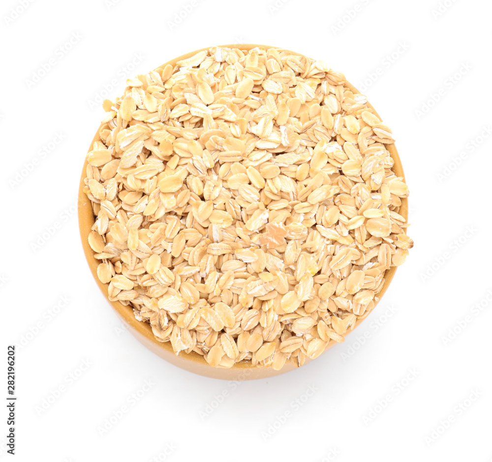 Bowl with raw oatmeal on white background Bowl with raw oatmeal on white background