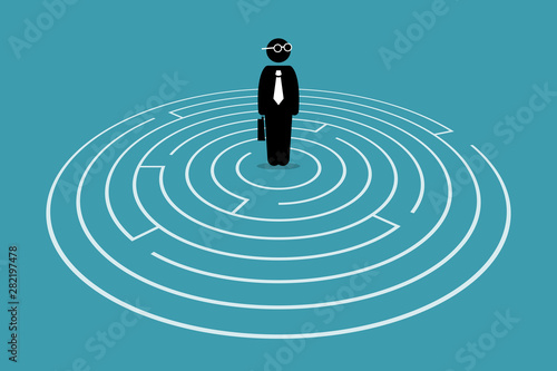 Businessman standing in the center of a maze. Vector artwork concept depicts challenge, finding the way out, escape, hurdles, solving issue, and solution for problem.