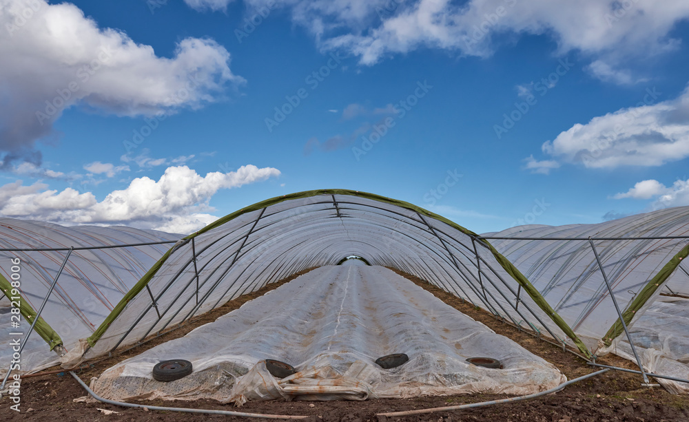 The Entrance to a Farm Polytunnel, one of many in a Field in Arbroath where Strawberries and other soft fruit is grown in Scotland.