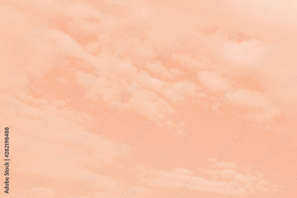 Fototapeta premium Vector illustration of a orange sky and white clouds.