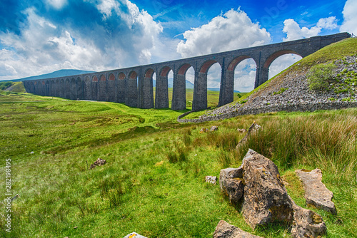 View of large Victorian viaduct in rural countryside scenery photo