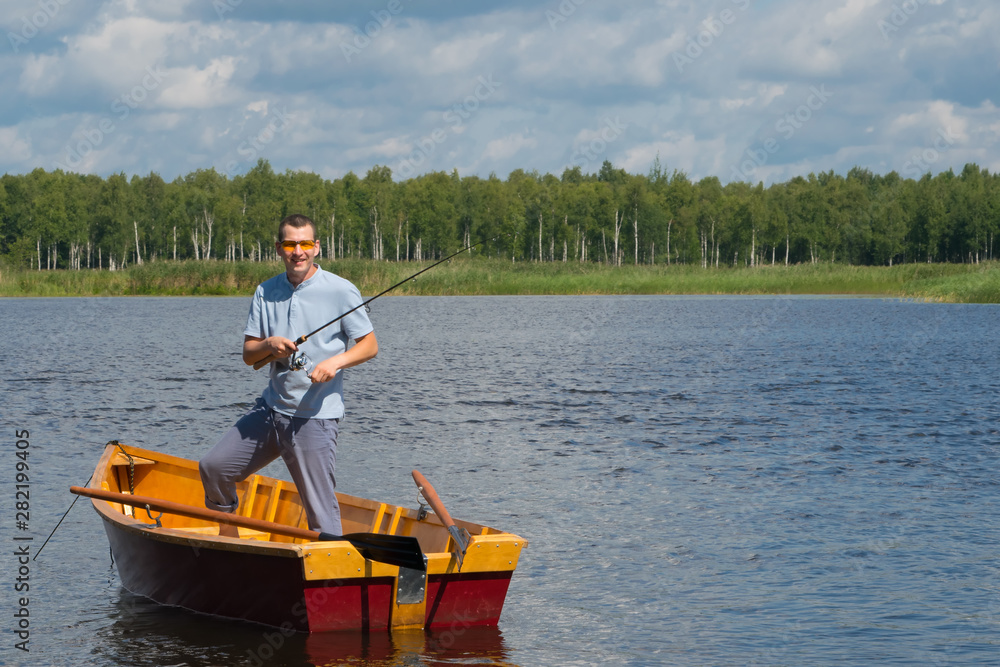 a cheerful man in yellow glasses, in a boat with oars, in the center of the lake, holds a fishing pole to catch a big fish, in the background of a beautiful landscape a cheerful man in yellow glasses, in a boat with oars, in the center of the lake, holds a fishing pole to catch a big fish, in the background of a beautiful landscape
