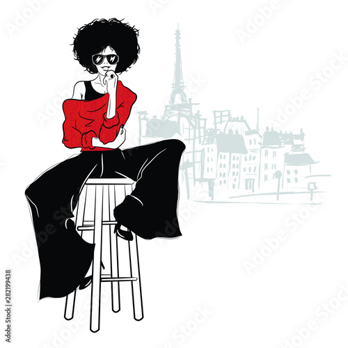 Fashion girl in sketch style on a white background. Vector illustration.