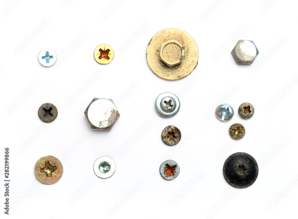 Screw heads, nuts, rivets isolated on white. Screw heads, nuts, rivets isolated on white.