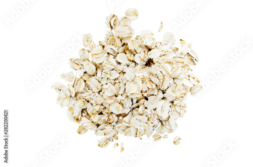 Oat flakes without shade isolated on white background. Fast breakfast and a healthy food. For advertising, packaging.