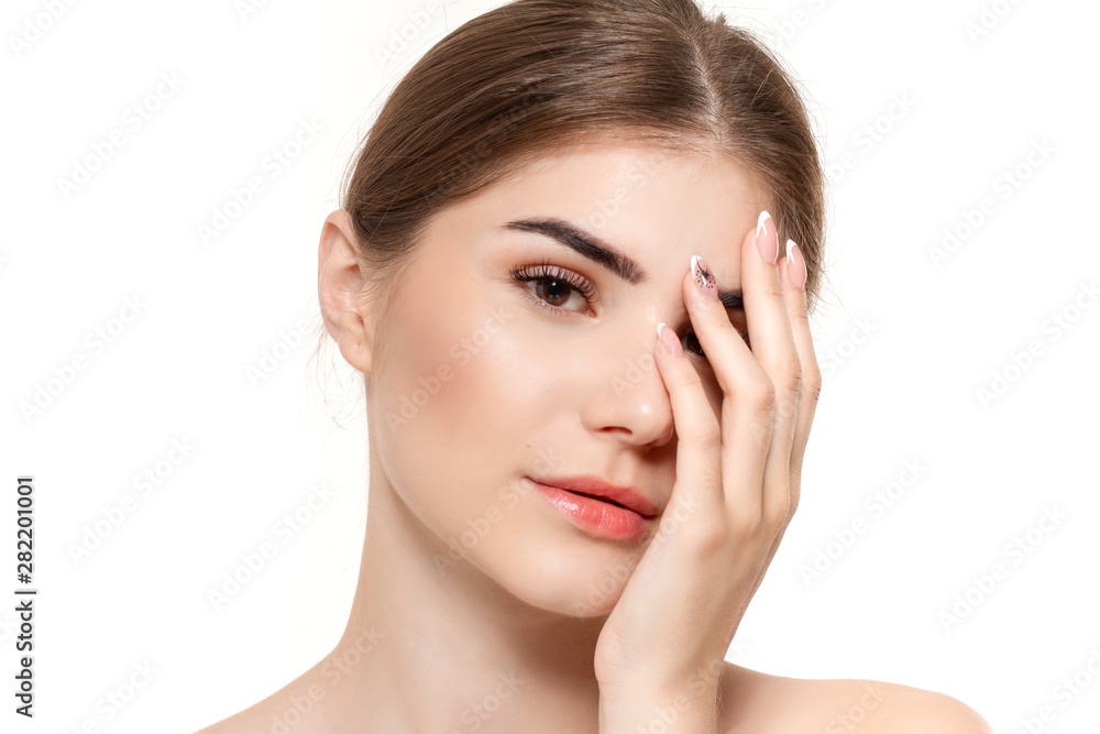 Close-up portrait of a beautiful young girl with holding hands near face isolated over white background. Close-up portrait of a beautiful young girl with holding hands near face isolated over white background.