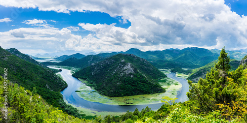 Montenegro, XXL panorama of crnojevica river water bend at pavlova strana inside green valley in national park skadar lake nature landscape