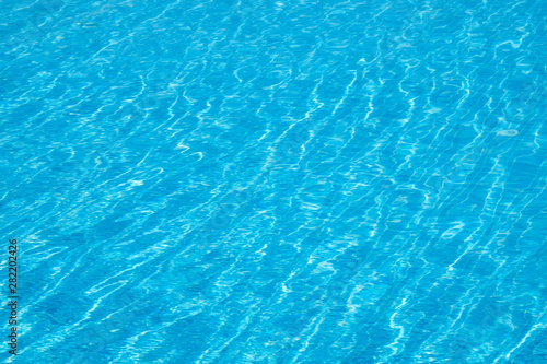 Water in swimming pool. Blue background water in a pool