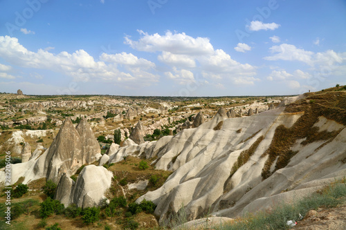 Beautiful panoramic view of pink valley in Cappadocia. Free lifestyle. Cappadocia region of Turkey, Asia. Traveling concept background.