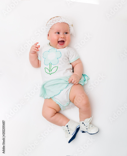 Portrait of a baby girl on a white background