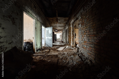 Abandoned corridor in damaged building