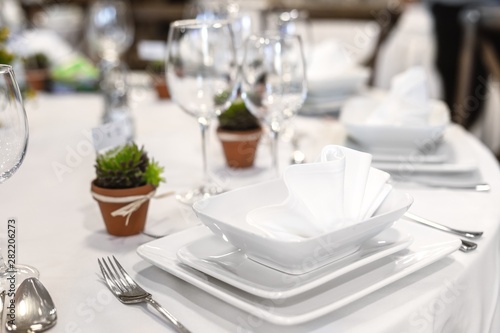 Plates and dishes on dining table