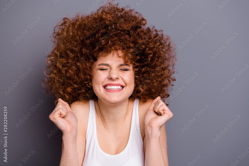 Close up photo of foxy lady celebrate unbelievable success rejoice wear white tank-top isolated grey background Close up photo of foxy lady celebrate unbelievable success rejoice wear white tank-top isolated grey background