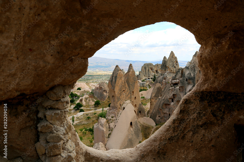 Beautiful panoramic view of pink valley in Cappadocia. Free lifestyle. Cappadocia region of Turkey, Asia. Traveling concept background. Beautiful panoramic view of pink valley in Cappadocia. Free lifestyle. Cappadocia region of Turkey, Asia. Traveling concept background.