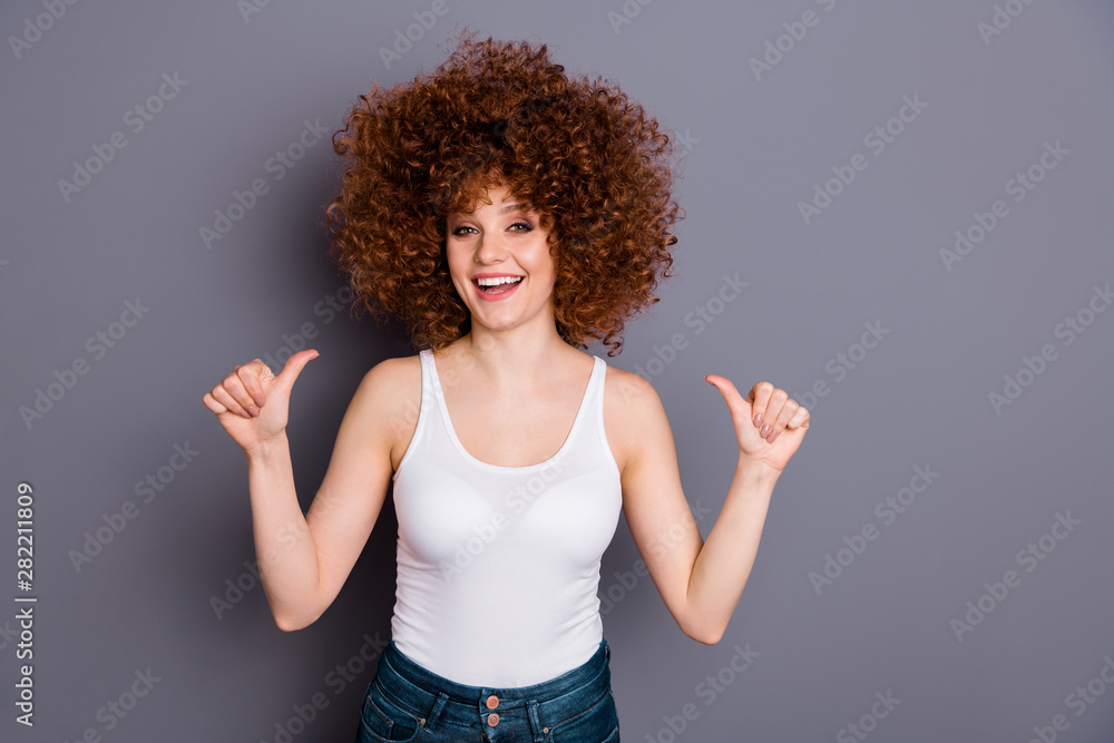 Portrait of sweet cute lady advising herself laugh arrogant egocentric isolated over grey background Portrait of sweet cute lady advising herself laugh arrogant egocentric isolated over grey background