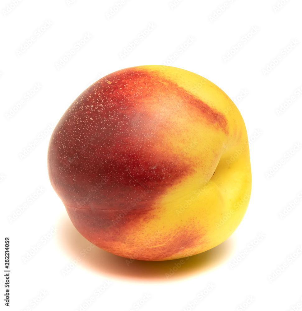 Obraz premium nectarine fruit lies on a white background