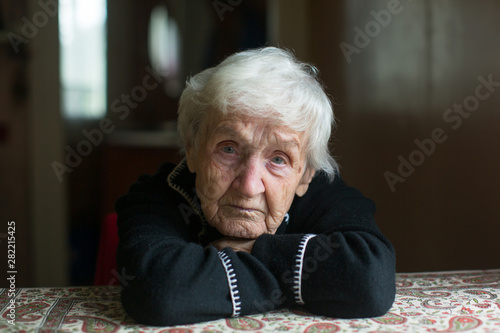 Close-up portrait of an elderly meloncholic pensioner woman.