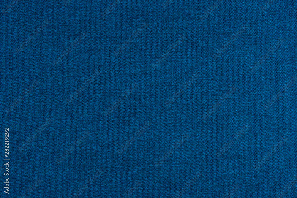 Blue texture of fabric from a textile material Blue texture of fabric from a textile material