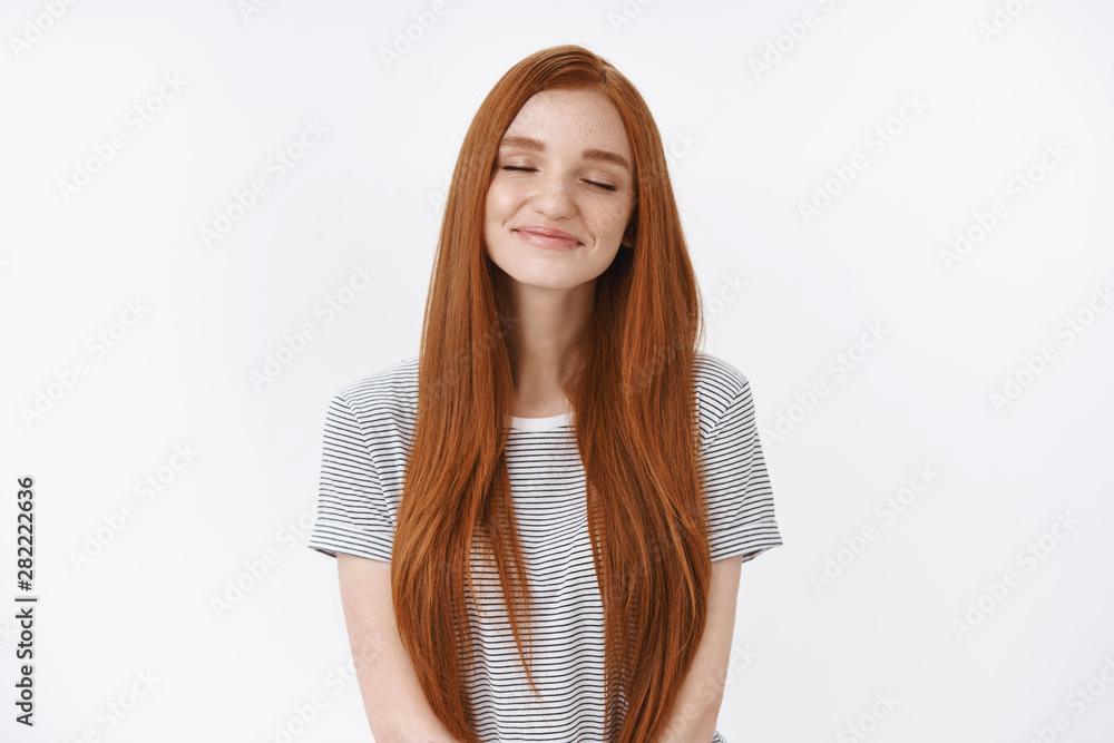 Waist-up shot dreamy romantic charming smiling relaxed redhead girl closed eyes tender delighted smile imagine perfect lovely moment daydreaming making wish recalling nice memory, white background Waist-up shot dreamy romantic charming smiling relaxed redhead girl closed eyes tender delighted smile imagine perfect lovely moment daydreaming making wish recalling nice memory, white background