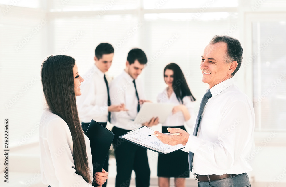 successful business team before a business meeting in the lobby