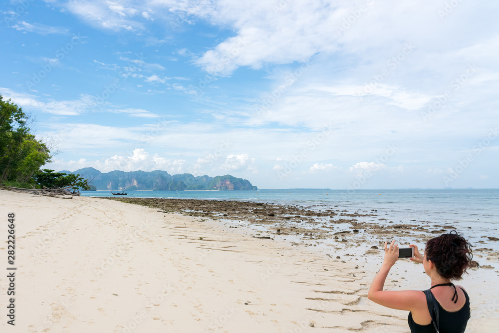young cute hipster girl travelling at beautiful blue sky paradise tropical coast beach PP Island Krabi Phuket Thailand guiding idea for long weekend female relax rest woman women planning life young cute hipster girl travelling at beautiful blue sky paradise tropical coast beach PP Island Krabi Phuket Thailand guiding idea for long weekend female relax rest woman women planning life