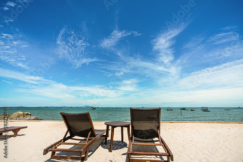 Fototapeta Naklejka Na Ścianę i Meble -  happy sitting relaxing resting idea  guiding travelling planning stuff  accessories items long weekend  idea at beautiful sky tropical beach  paradisecoconut palm tree PP Island  Krabi Phuket Thailand