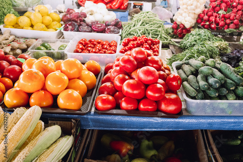 big choice of fresh vegetables on market counter