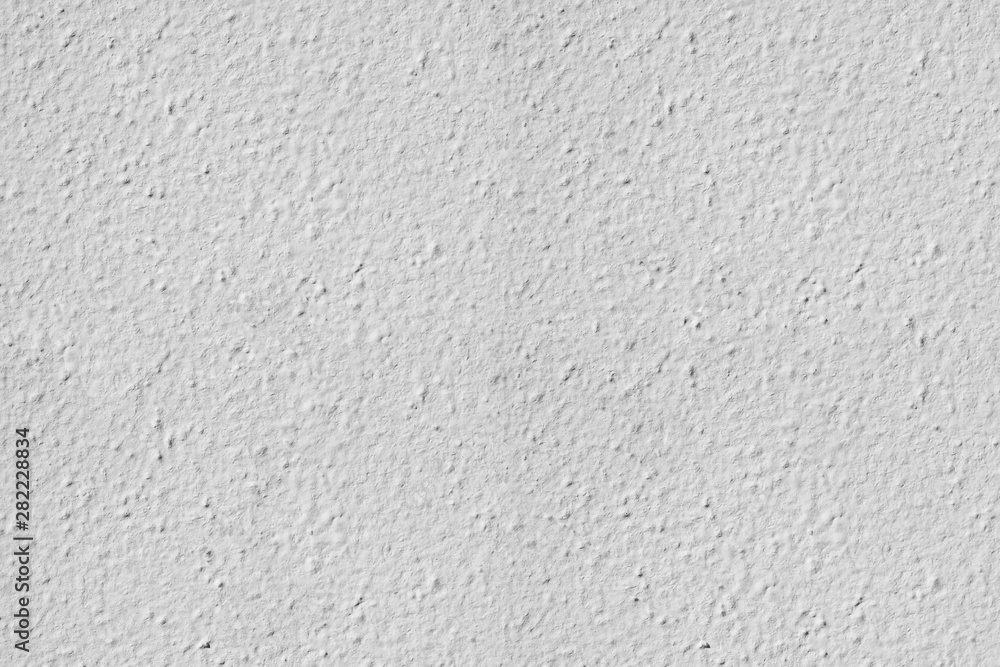 Rough plaster background with grainy effect surface Rough plaster background with grainy effect surface