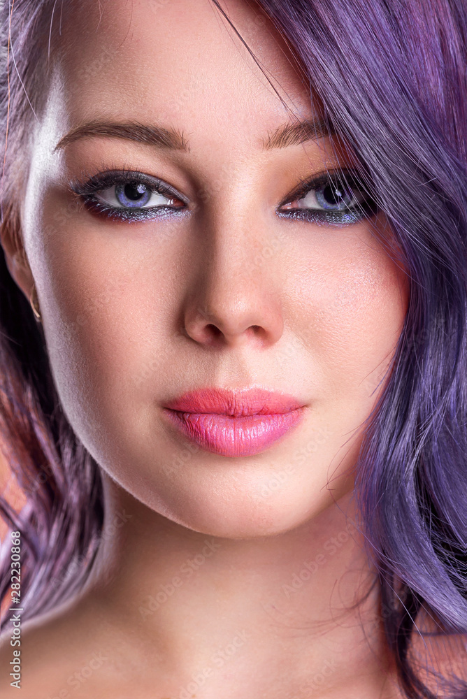 Fototapeta premium portrait of a beautiful girl close-up, face with makeup
