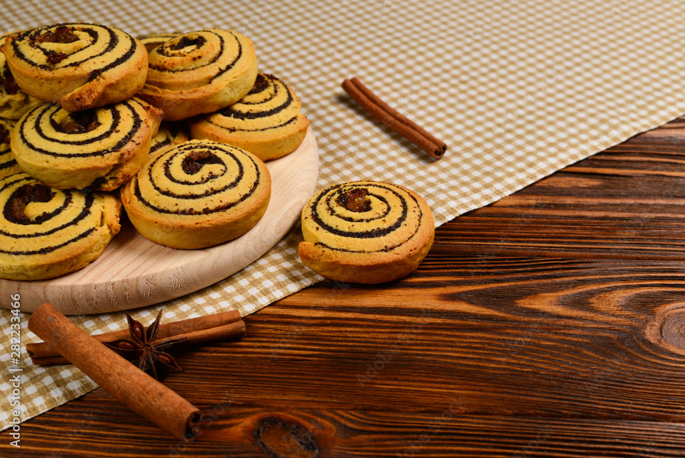 Home made baked cookies with raisins and poppy seeds. Space for text or design. Home made baked cookies with raisins and poppy seeds. Space for text or design.